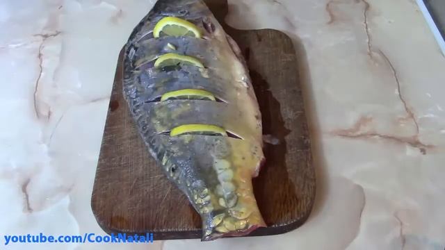 Карп запеченный в духовке с овощами