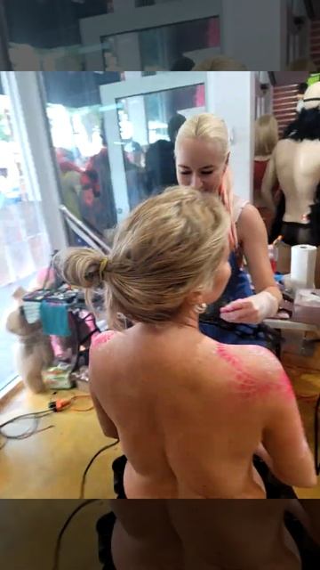 Bodypainter in action - Painting costumes for Fantasy Fest