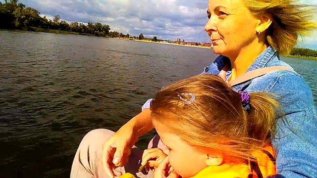 На катамаране.