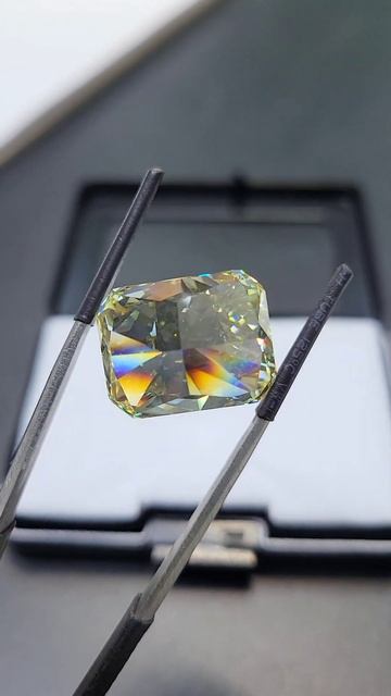 25 CARAT RADIANT FANCY LIGHT YELLOW