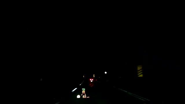 Radar guided cruise control in a BMW 7-Series detects a scooter at night смотреть онлайн