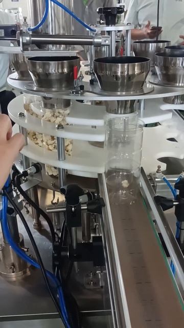 Popcorn plastic tube filling machine, Popcorn plastic cans packing equipment смотреть онлайн