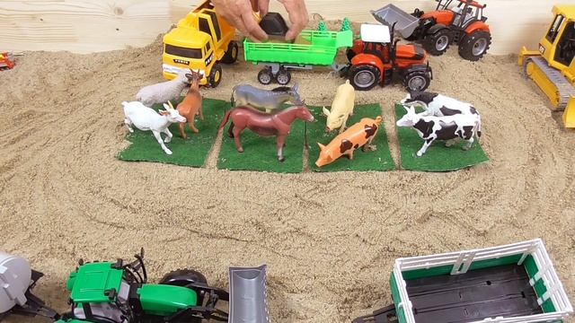 Buntes Spielzeug für Kinder; Traktoren, Baggerauto und Kranauto spielen im Sand; Kinderfilm смотреть онлайн