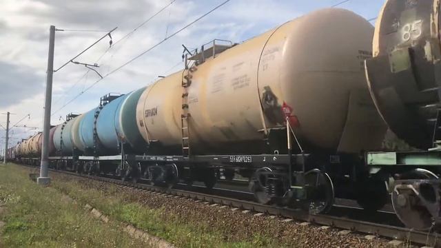 Тепловоз 2ТЭ116к 1029 с товарным составом из разных вагонов из ОРАНИЕНБАУМа-1.близ станции ЛИГОВО. смотреть онлайн