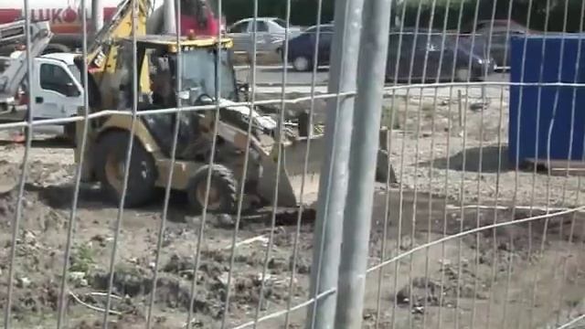CAT 428E leveling terrain смотреть онлайн