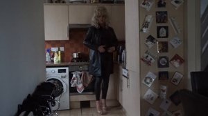 Crossdresser in Leather Coat, Leather Leggings and Heels