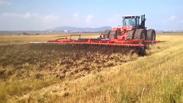 Трактор 570 с дисковой бороной РОСТСЕЛЬМАШ DX-850/1080 10.8 м (Казахстан) смотреть онлайн