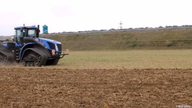 Гусеничный трактор New Holland T9 560 смотреть онлайн
