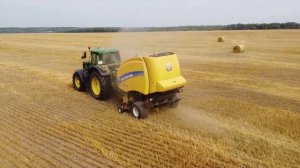 Рулонный пресс-подборщик New Holland RB180.