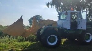 Осмотр трактора Т - 150 с фронтальным погрузчиком