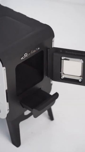 Shorts: Дровяная отопительная печь Stoker COLIBRI 5-C со стеклом и складными ножками: смотреть онлайн