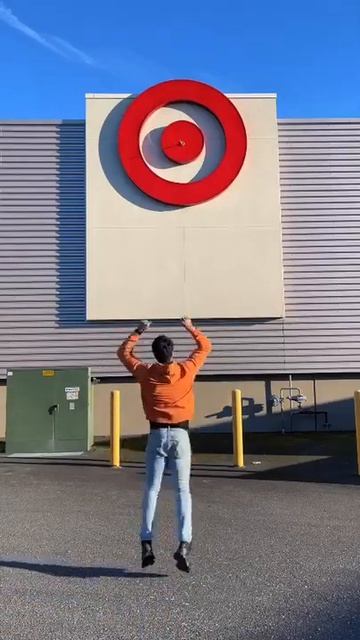 Guy Throws Rubber Plunger at Highly Placed Departmental Store's Logo - 1287169 смотреть онлайн