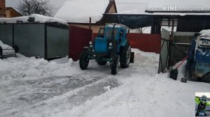 Весенняя чистка снега на тракторе т-40