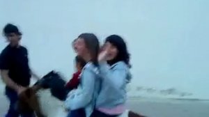 Two girls riding a pony (part 2)