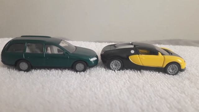 Siku 1/55 Bugatti veyron and Opel omega .And special gift at the end . смотреть онлайн