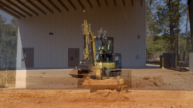 Cat® 304.5E2 XTC Mini Excavator Working with Multi Purpose Bucket смотреть онлайн