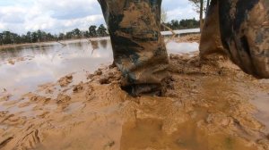 Nora and riding rubber boots in mud 2