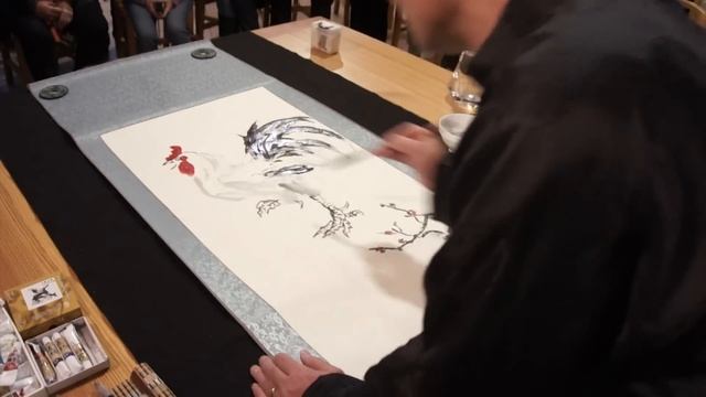 Victoria and Henry Li doing a rooster painting demo at Briancon, France смотреть онлайн