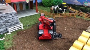 BRUDER tractor farming toys | John Deere haybale action video for kids!