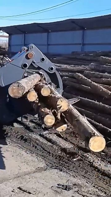 Фронтальный захват для леса Exten Log2 для экскаватора-погрузчика. смотреть онлайн