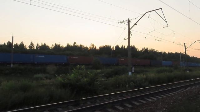 Электровоз ВЛ11-021А/034 с грузовым поездом платформа 211 км БМО 10.07.2021 | VL11-021A/034 at BMO смотреть онлайн