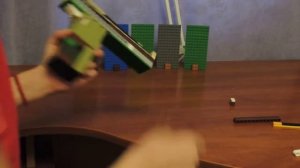 как сделать стреляющий пистолет из лего