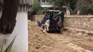 Мини экскаватор-погрузчик