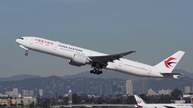 China Eastern Airlines Boeing 777-300ER [B-2002] Departing LAX.