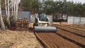 Культиватор Exten Raks 2000 на мини-погрузчике Bobcat S185