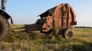 МТЗ-80.1 с пресс подборщиком ПРФ-145 на заготовке сена