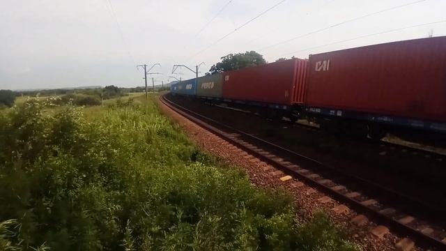 Электровоз 3ЭС5К-342 "Ермак" с контейнерным поездом летним утром на Транссибирской магистрали. смотреть онлайн