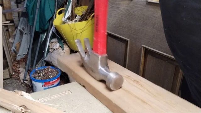 removing nails from some pallet wood using a hammer смотреть онлайн