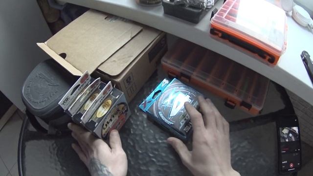 Обзор посылки, катушки - приманок, спиннинг  Nissin Ares