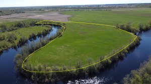 Участок 400 соток на  реке Луга, первая береговая линия речки