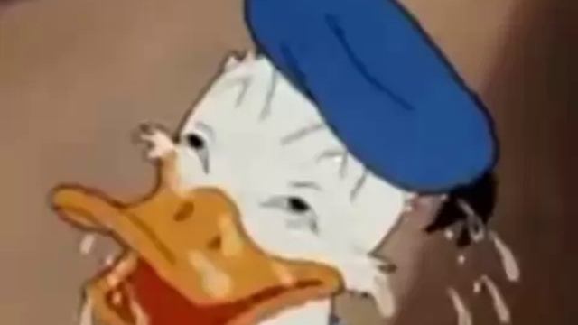 Дональд Дак (неразборчиво)