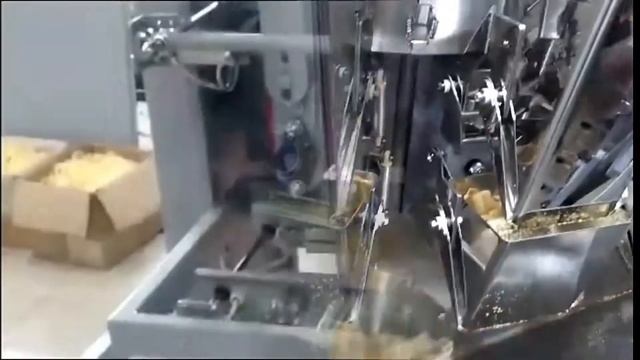 Линия фасовки и упаковки чипсов с мультиголовочным дозатором смотреть онлайн