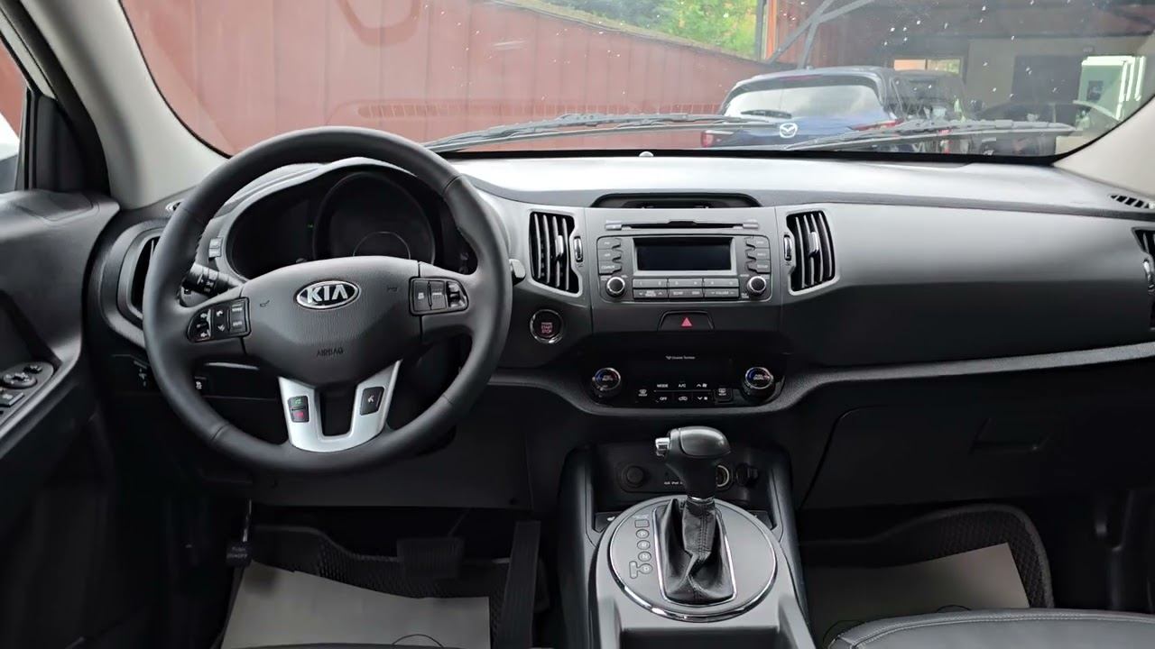 Kia Sportage 2.0 2013 года: обзор автомобиля смотреть онлайн