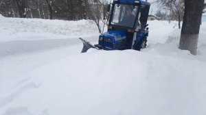 Японский минитрактор Iseki с поворотным отвалом