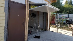 Подъемно-складные ворота своими руками из PIR-панели