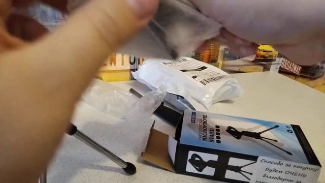 распаковка держателя для микрофона смотреть онлайн