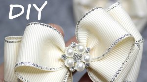 Прекрасный маленький бант из лент с люрексом шириной 2,5 см. Сможет сделать каждый