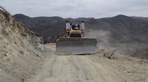 Строительство, срезаем горный склон