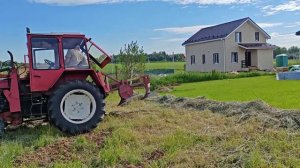 Вспашка трактором земли на участке