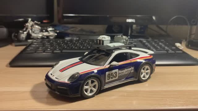 Обзор модели Porsche 911 Dakar в масштабе 1/24 от Bburago смотреть онлайн