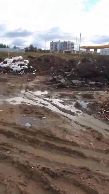 Строительный грунт с мусором сбросили в районе мкр. Мо