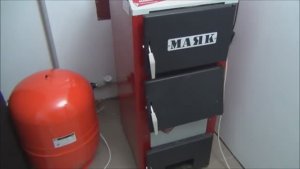 Первая топка твердотопливного котла после подключения.