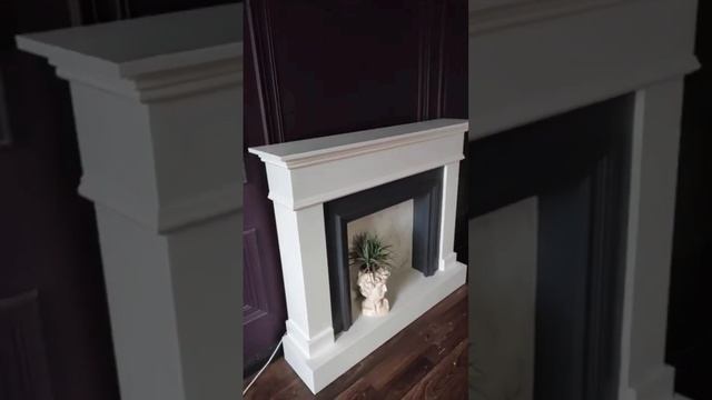 камин с подсветкой и задней стенкой под мрамор