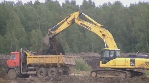 Экскаватор Komatsu PC300-7, самосвалы Tatra и Scania