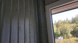 Обшили стены гаража б/у профлистом