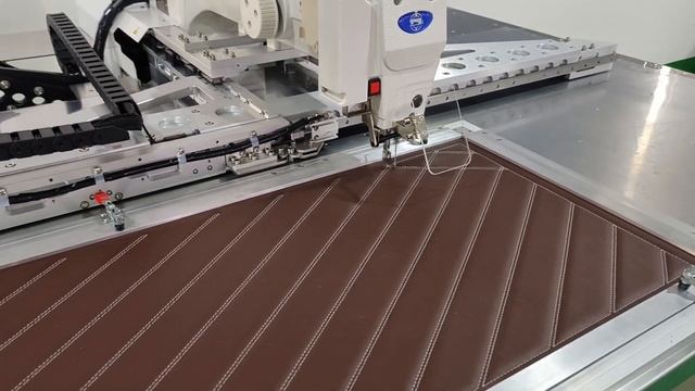 Автомат программируемой строчки промышленная швейна?